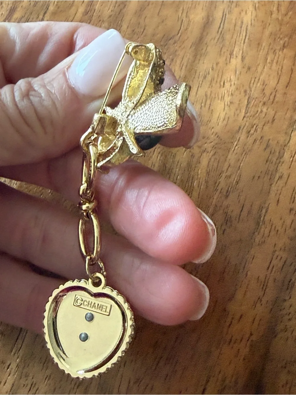 Gold Bee Brooch with Black Enamel Heart and Crystal Accents